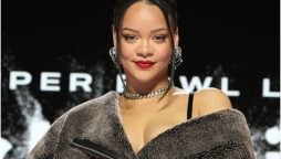 Rihanna’s Baby Bump Steals the Show in RATM T-Shirt