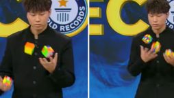 Chinese Man Juggles and Solves 3 Rubik's Cubes in Record Time