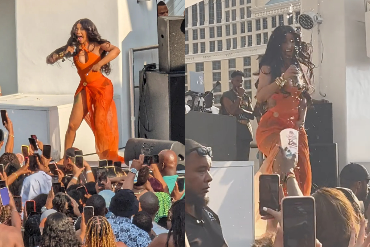 A fan three drink on Cardi B during concert