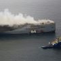 Burning car carrier off Dutch coast being dragged away from shipping lanes
