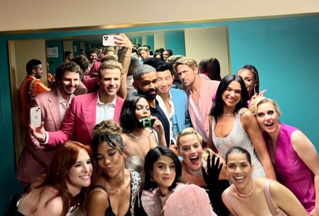 Dua Lipa poses with Barbie cast Ryan Gosling and Margot Robbie