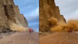 Cliff collapse in UK sends tourists running for their lives