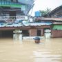 Myanmar Floods: Baby Rests Amid Evacuations and Relief