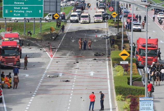 Plane Crashes onto Malaysian Expressway, Killing at Least 10