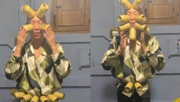 Japanese Man Suctions 11 Cans to Head for World Record