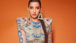 Nora Fatehi stuns in a shimmering bodycon dress