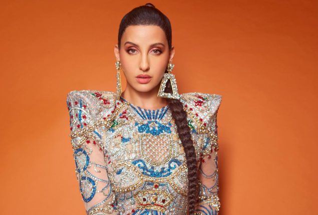 Nora Fatehi stuns in a shimmering bodycon dress