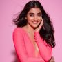 Pooja Hedge Embraces Barbie Look with Plunging Neckline Bodycon Dress