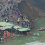 Landslide in Myanmar kills over 100, buries villagers in lake