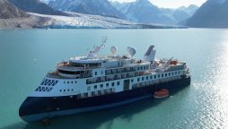 Folks learn towel origami on stranded Ocean Explorer cruise liner