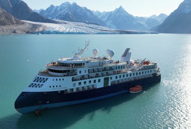 Folks learn towel origami on stranded Ocean Explorer cruise liner