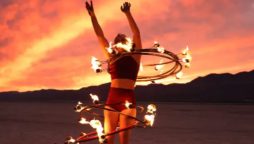 Circus artist uses fiery hula hoop to set world record