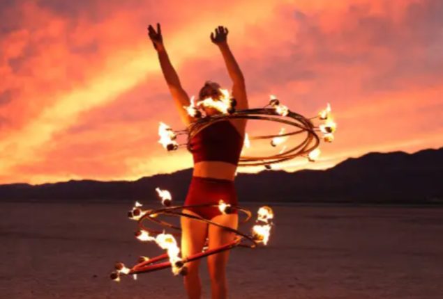 Circus artist uses fiery hula hoop to set world record