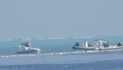 South China Sea Tension Rises as China Installs Floating Barrier