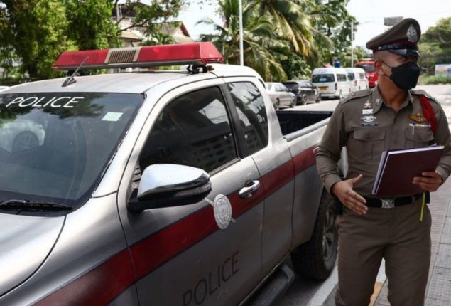 Thai man beating his children