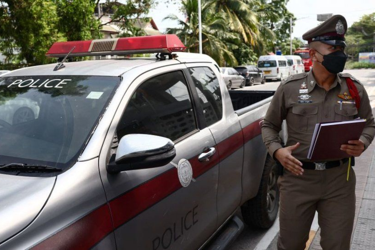 Thai man beating his children