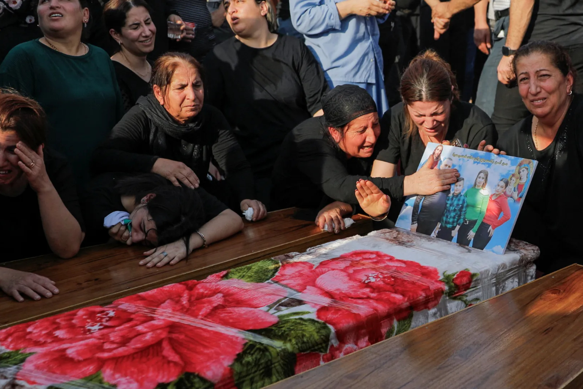 Funerals held as more than 100 killed in Iraq wedding fire