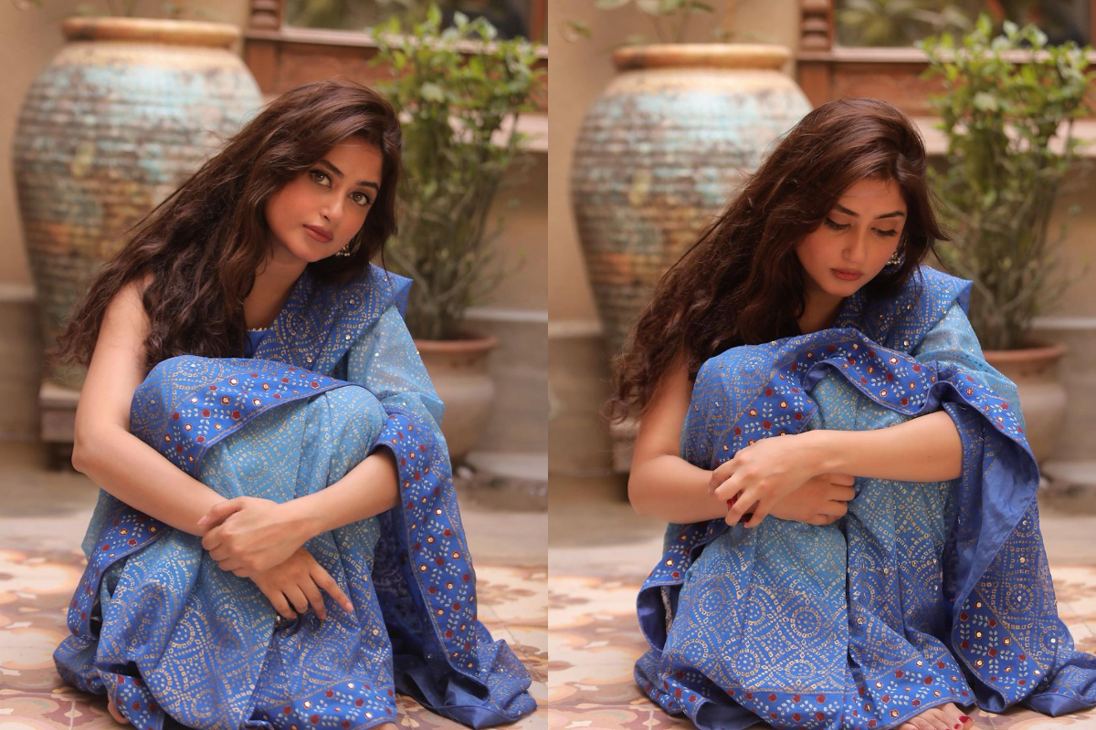 Sajal Aly astonishing pictures in a blue shimmery saree