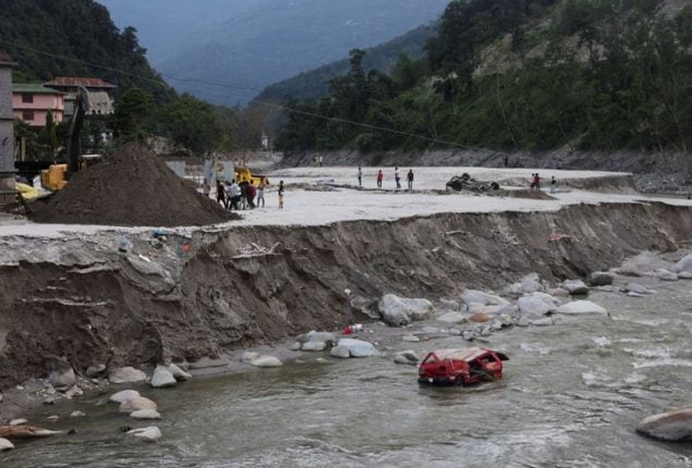 Himalayan flash floods leave 74 dead, 100 missing