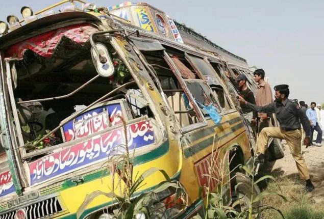 Bus overturns