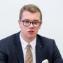 German politician detained after complaining about Nazi slogans