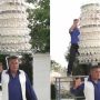 World Record: Man Balances 319 Glasses on His Head