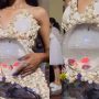 Woman Criticized for Wearing Live Fish in Dress