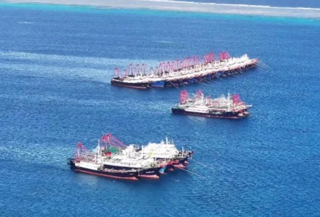 Philippines accuses China of ‘swarming’ coral reef with military vessels