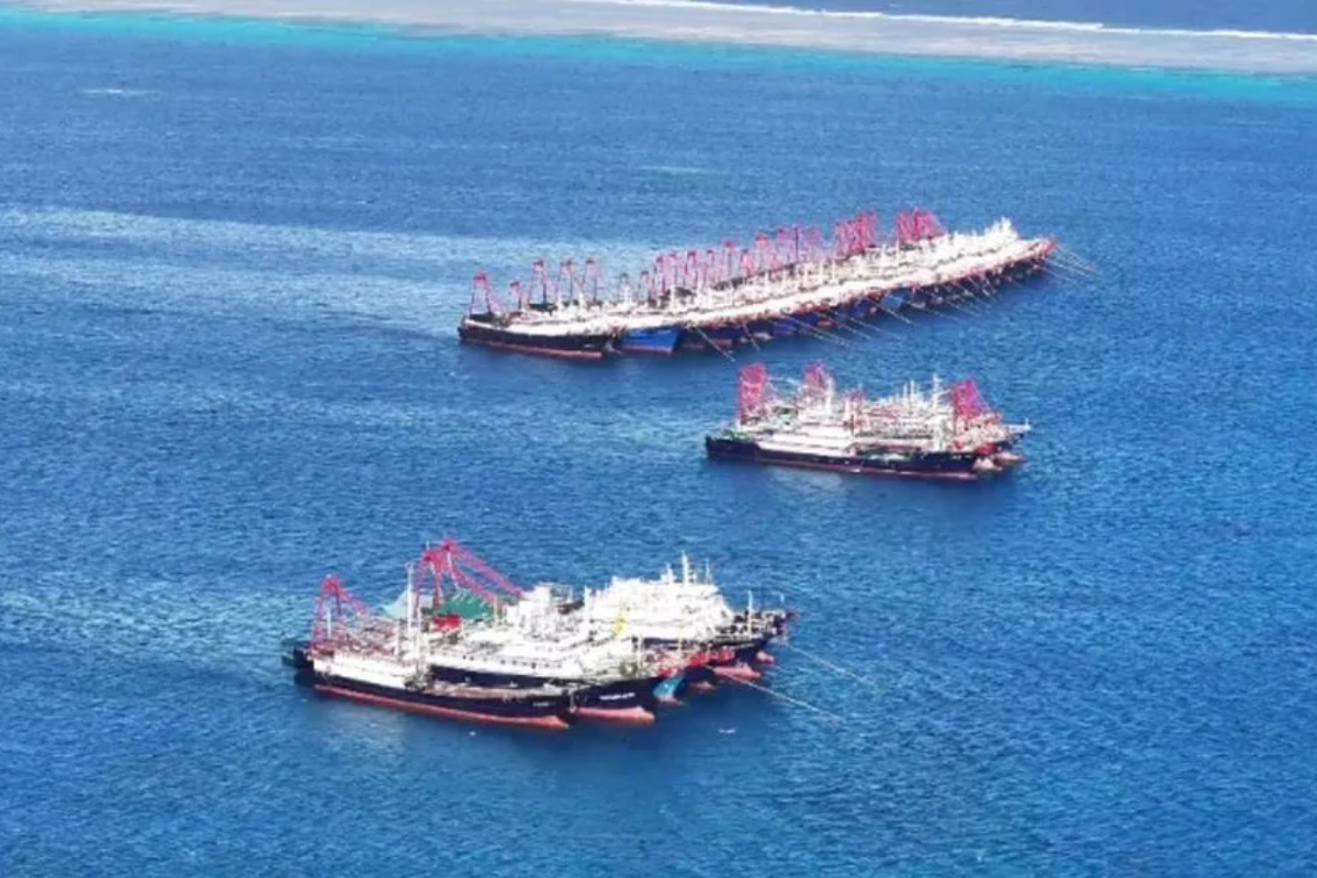 Philippines accuses China of 'swarming' coral reef with military vessels