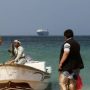 Commercial oil tanker struck by missile in Red Sea, Houthis suspected