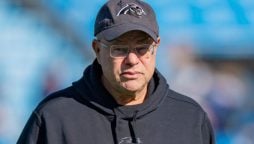 NFL slams Panthers owner with hefty fine for fan beverage toss