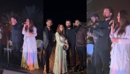 Hadiqa Kiani and Atif Aslam singing together on stage in Dubai at New Year