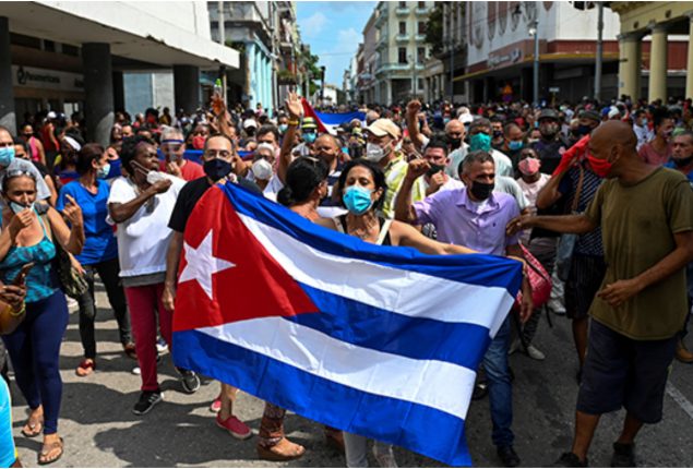 Cubans rally against power blackouts in rare street protest