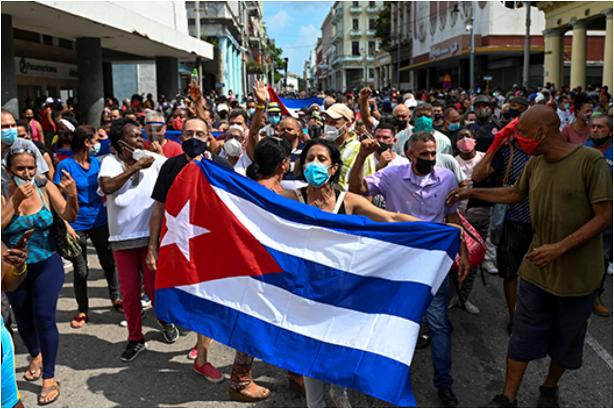 Cubans rally against power blackouts in rare street protest