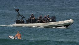 Indonesian police claim Australia sent back dozens of illegal migrants to a remote island