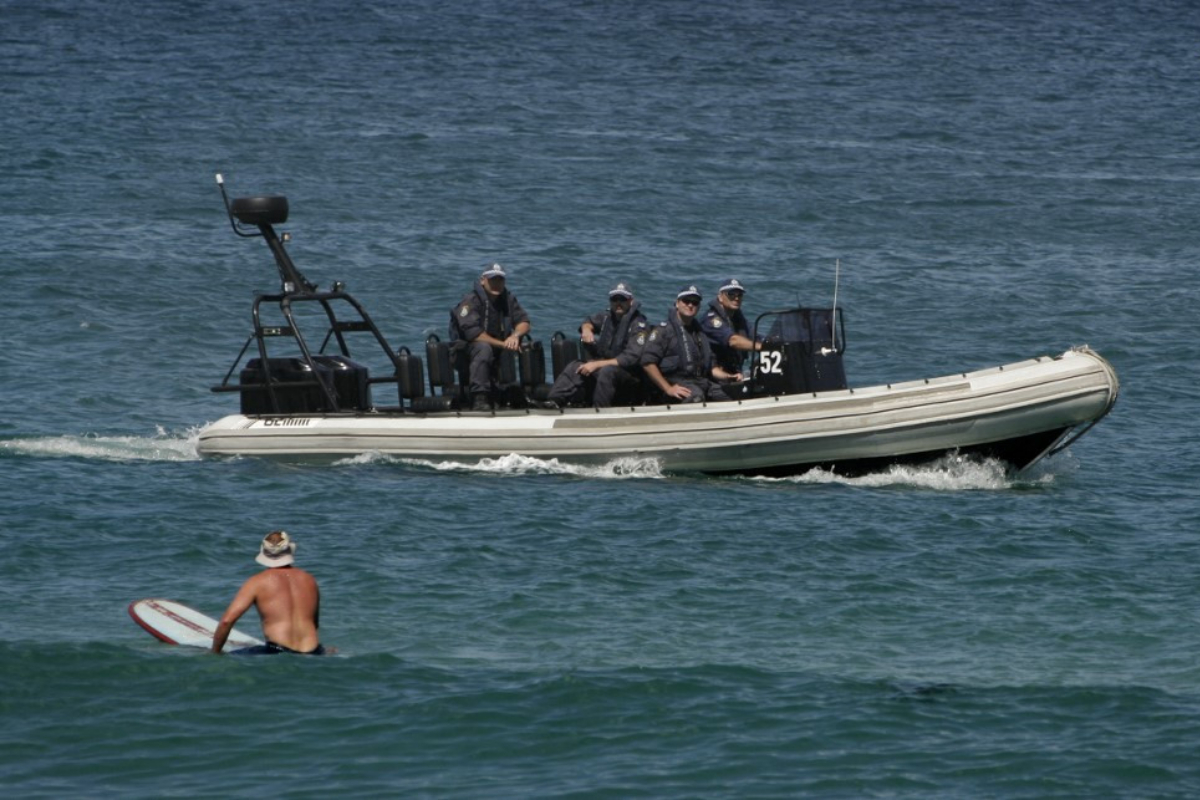 Indonesian police claim Australia sent back dozens of illegal migrants to a remote island