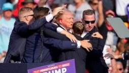 Donald Trump injured in election rally shooting, assailant killed