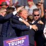 Donald Trump injured in election rally shooting, assailant killed