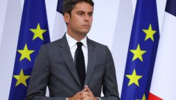 French PM looks to rebuild political support after party backing