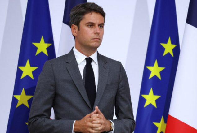 French PM looks to rebuild political support after party backing