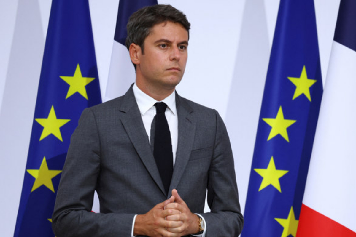 French PM looks to rebuild political support after party backing