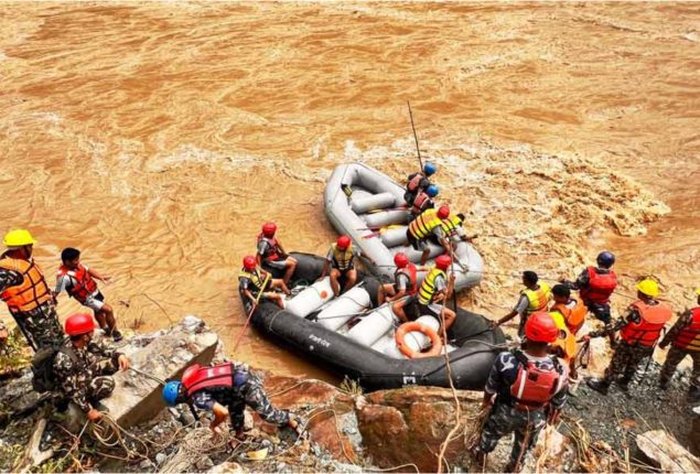 Nepal landslide: Rescuers retrieve 11 bodies after two buses swept into River