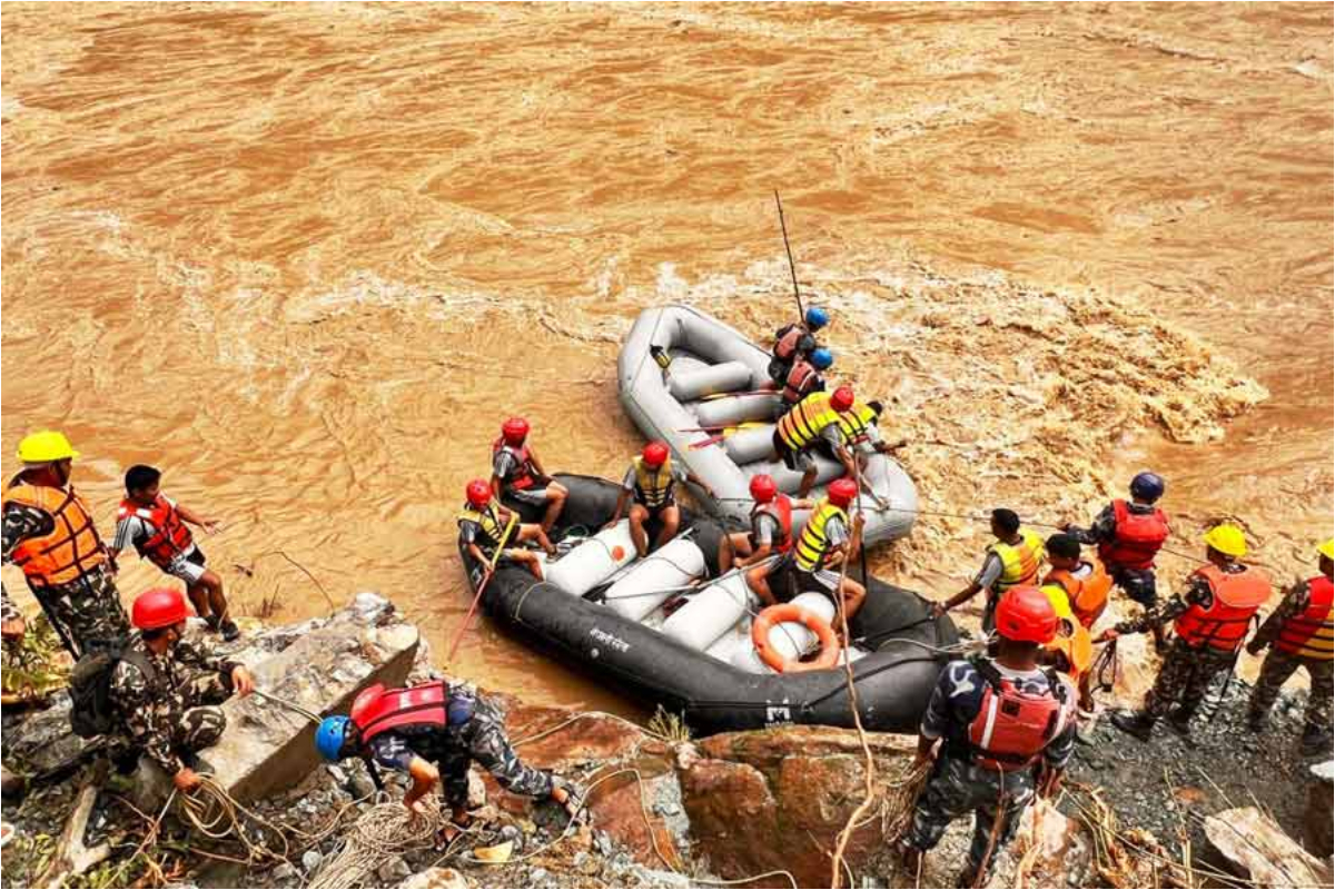Nepal landslide: Rescuers retrieve 11 bodies after two buses swept into River