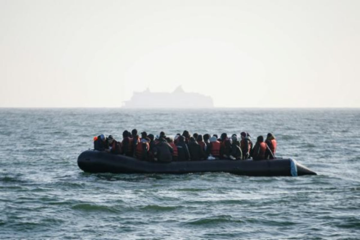 Britain faces surge as 700 migrants cross the channel in small boats