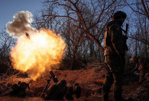 Russian soldiers charged in murder of pro-Moscow U.S. fighter