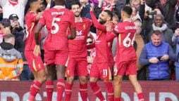 Liverpool top Premier League with 2-1 win over Chelsea