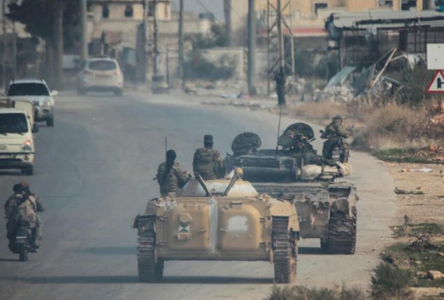 Syrian rebels sweep into Aleppo, army closes airport and roads