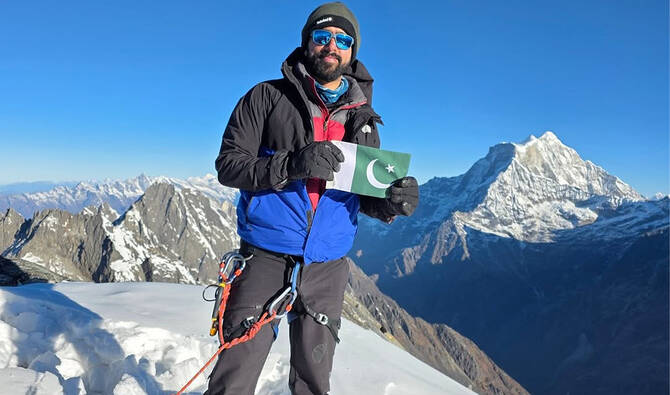 Pakistani climber Saad Munawar raises flag on Everest summit
