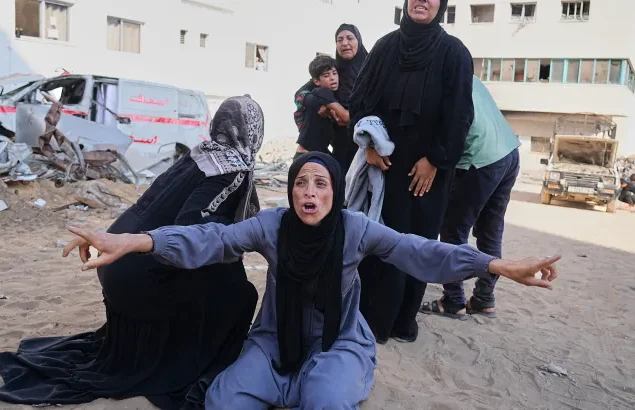 Israel kills 77 more Palestinians, Including 11 waiting for food aid