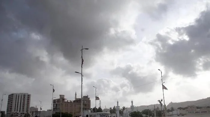 Karachi warms up under a grey sheet of sky